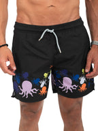 Black swim shorts with colorful octopus design on a white background